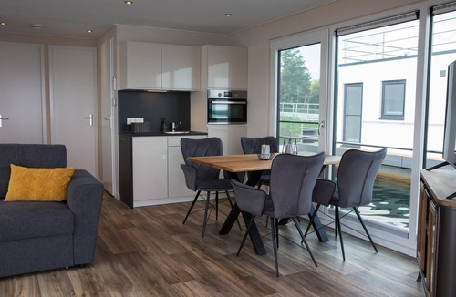 Laasow House | Floatinghouse Lutki in Vetschau with lake view, terrace & fireplace