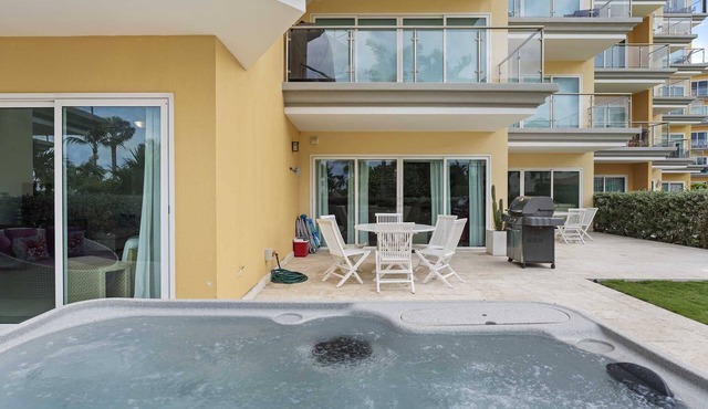 Beachfront - Beach Garden 2BR condo - E124 in Eagle Beach