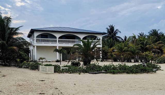 Luxury villa on the beach and just steps away from the famous Placencia sidewalk in Placencia