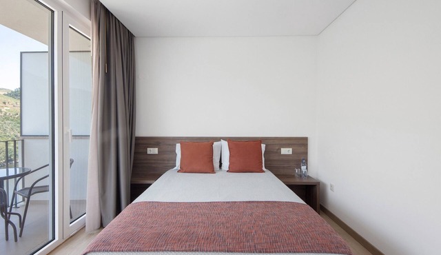 Property In A Holiday Village 'Quinta Da Pedra Caldeira H' with Mountain View and Air Conditioning in Cimbres