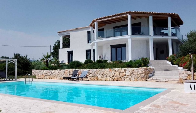 Villa VIO directly on the sea/beach with pool - miles of sandy beach in Corfu