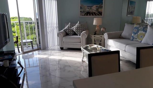 Its an enjoyable two bed/bath unit with pleasant view of the marina and 0cean. in Tavernier
